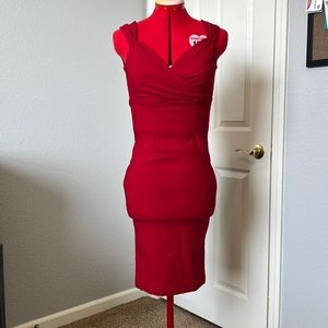 Rock steady size Med, red wiggle dress. Stretchy midi length
Never worn no tags